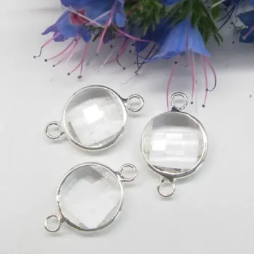 Metalowa zawieszka z fasetowanym, białym kryształkiem 12 mm okrągły